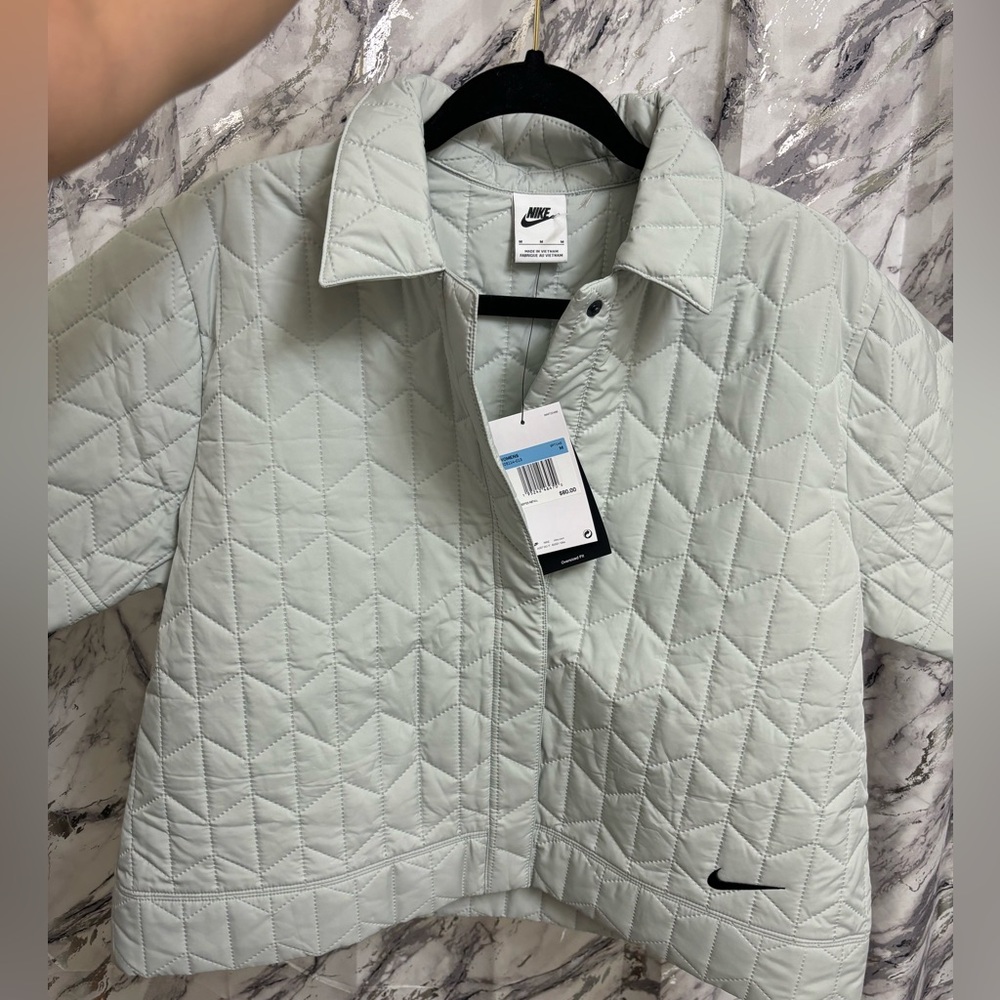 Women’s Nike quilted button up shirt.